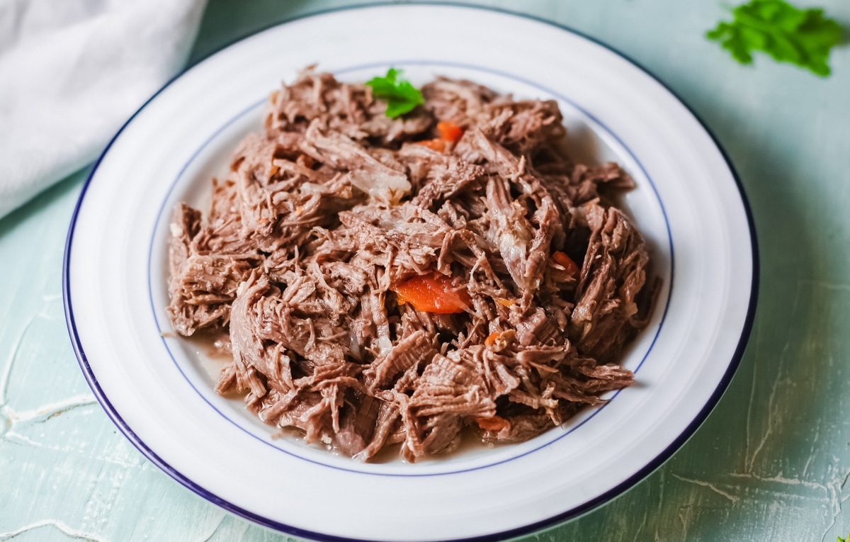 Learn how to make my mouthwatering Instant Pot barbacoa beef. Use it for tacos, burritos, and more! It's so tasty! I often throw it together on a weekend afternoon and use it in various recipes throughout the week! beef recipe in the instant pot