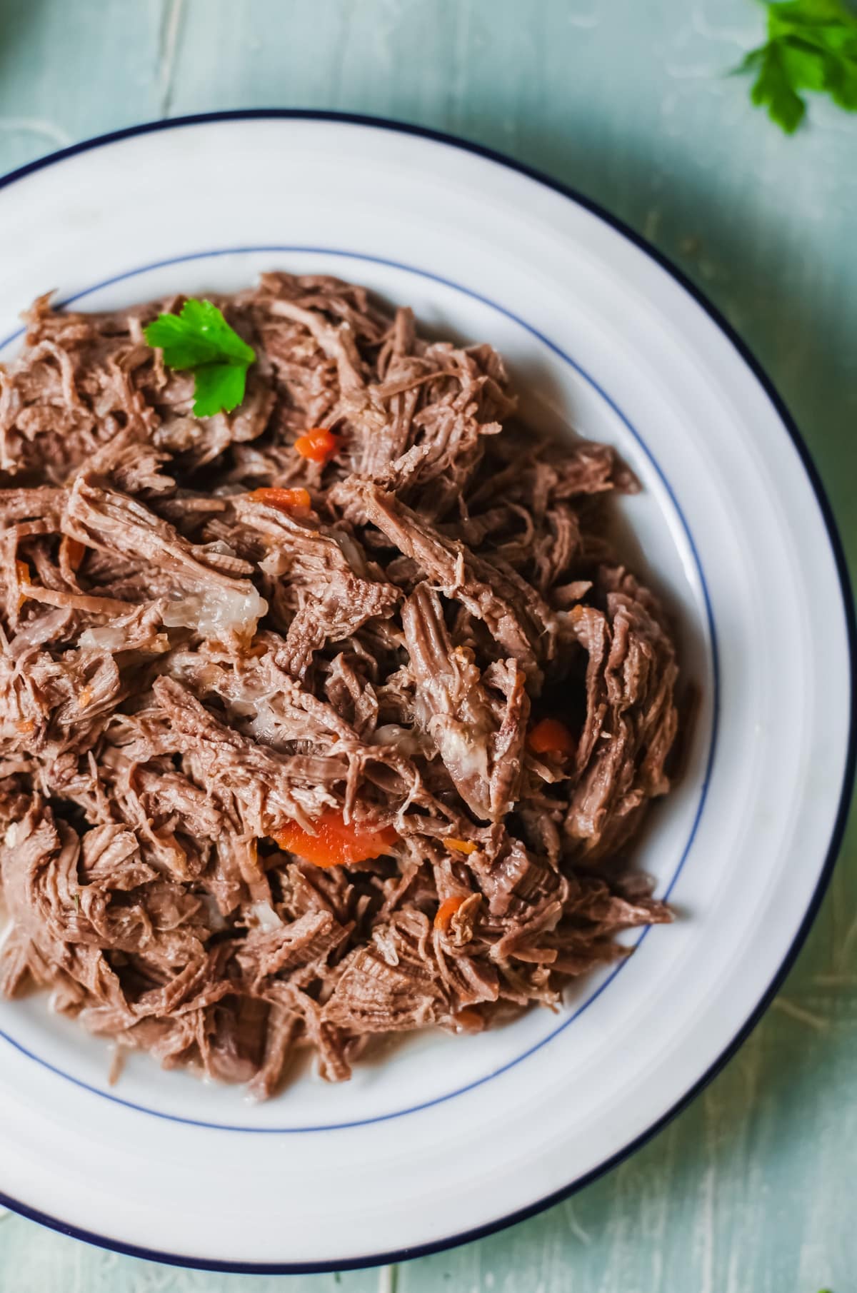 Learn how to make my mouthwatering Instant Pot barbacoa beef. Use it for tacos, burritos, and more! It's so tasty! I often throw it together on a weekend afternoon and use it in various recipes throughout the week! instant pot beef barbacoa