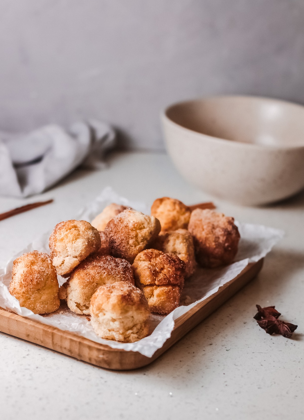 These air fryer cinnamon sugar donut holes are my quick and easy solution for satisfying donut cravings. This lightened-up version of classic cinnamon sugar donuts means I don't miss a thing when I pop a few of these in my mouth. They're just as good, if not better, than anything I'd get at a donut shop. doughnut holes with cinnamon sugar made in air fryer