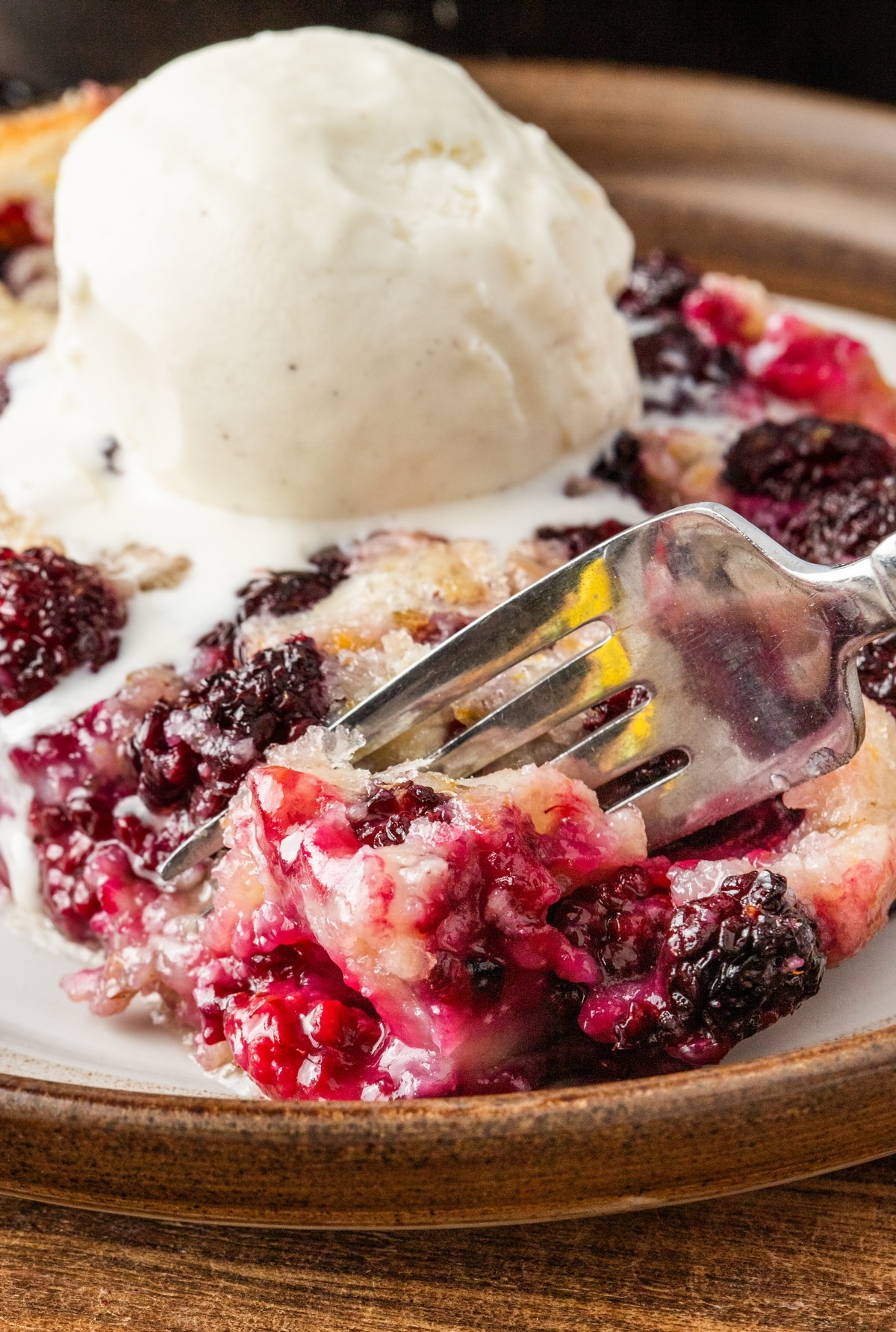 Enjoy the mouthwatering goodness of homemade blackberry cobbler. This recipe is a must-try for any dessert lover this summer! rustic blackberry cobbler