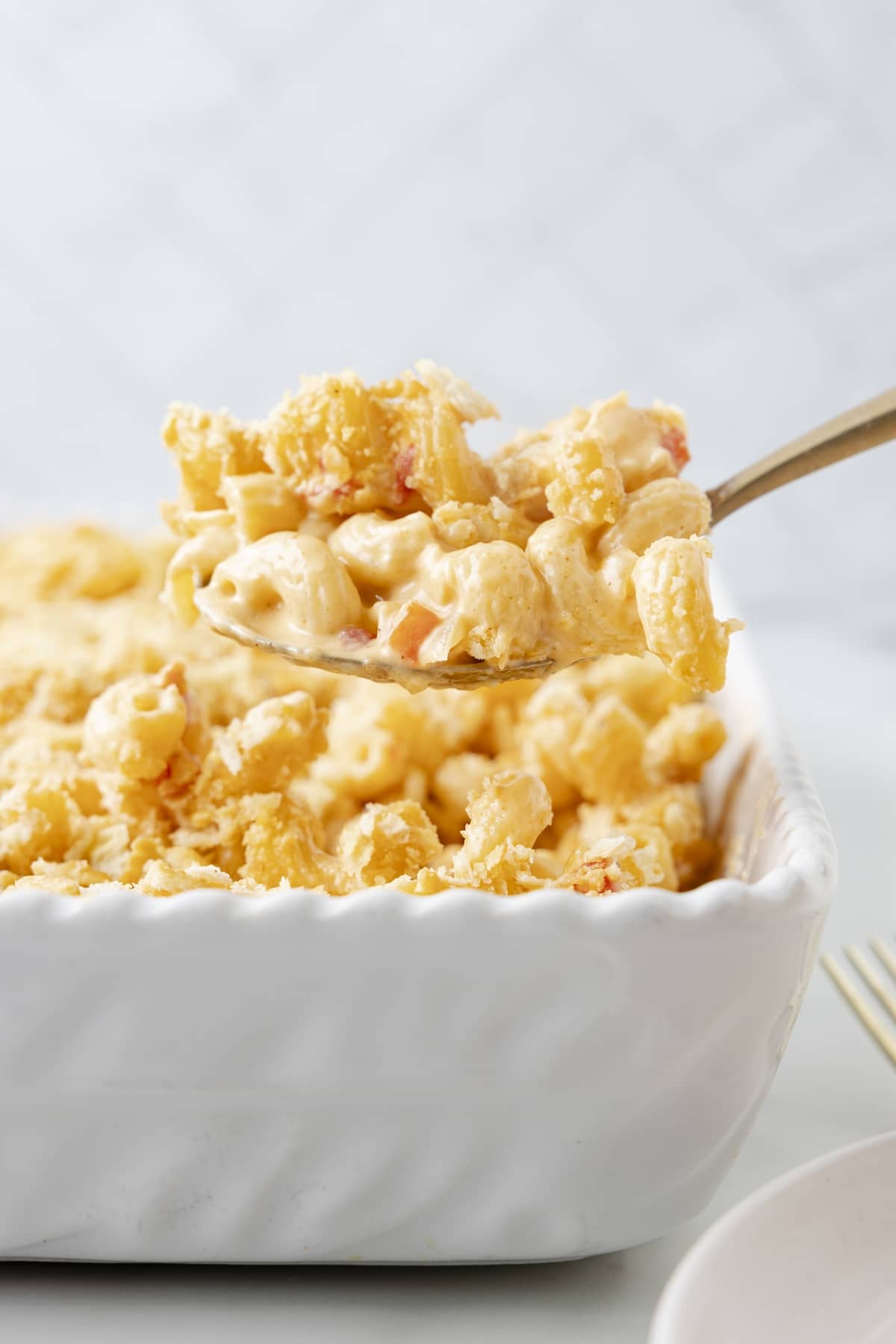 If you love pimento cheese in any form, you'll go crazy for it with macaroni. My pimento macaroni and cheese blends two Southern classics into one mouthwatering dish. The creamy cheese sauce, pimento peppers and crushed Ritz cracker topping make this a favorite side dish. macaroni and cheese with pimentos recipe