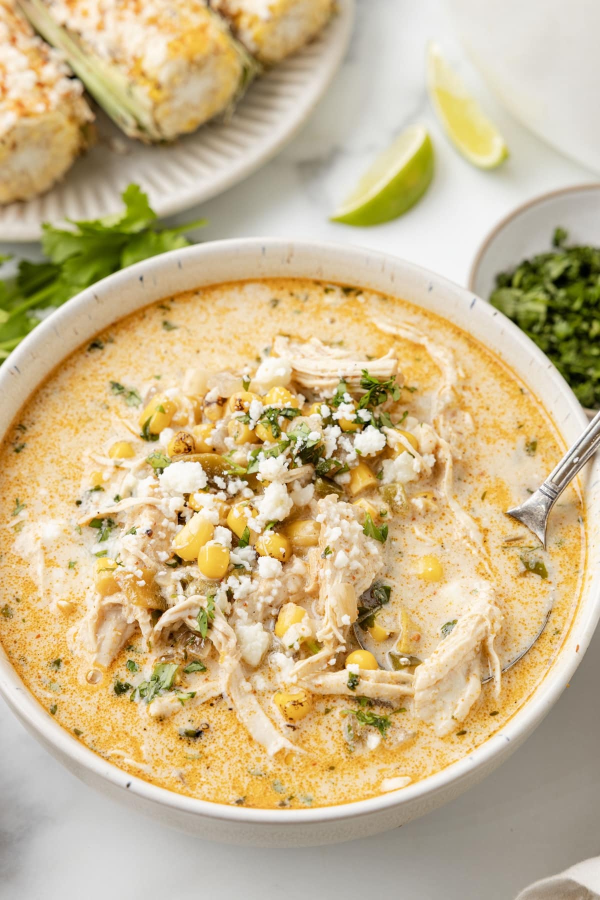 Mexican Street Corn Soup with chicken Mexican street corn soup in a bowl