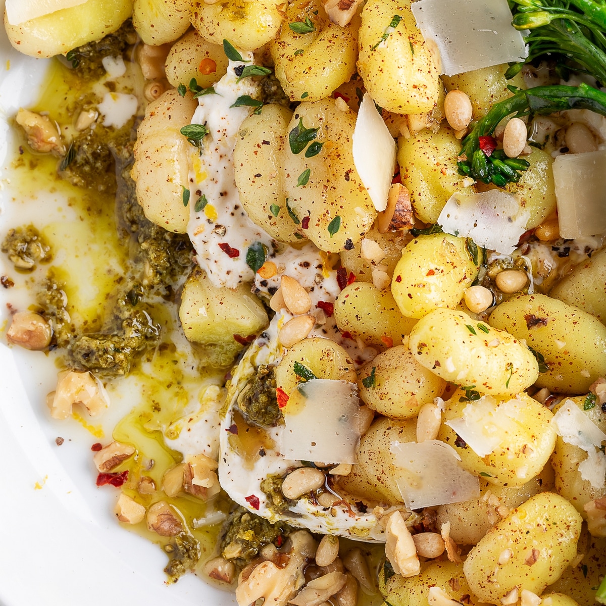 brown butter gnocchi with burrata and pesto