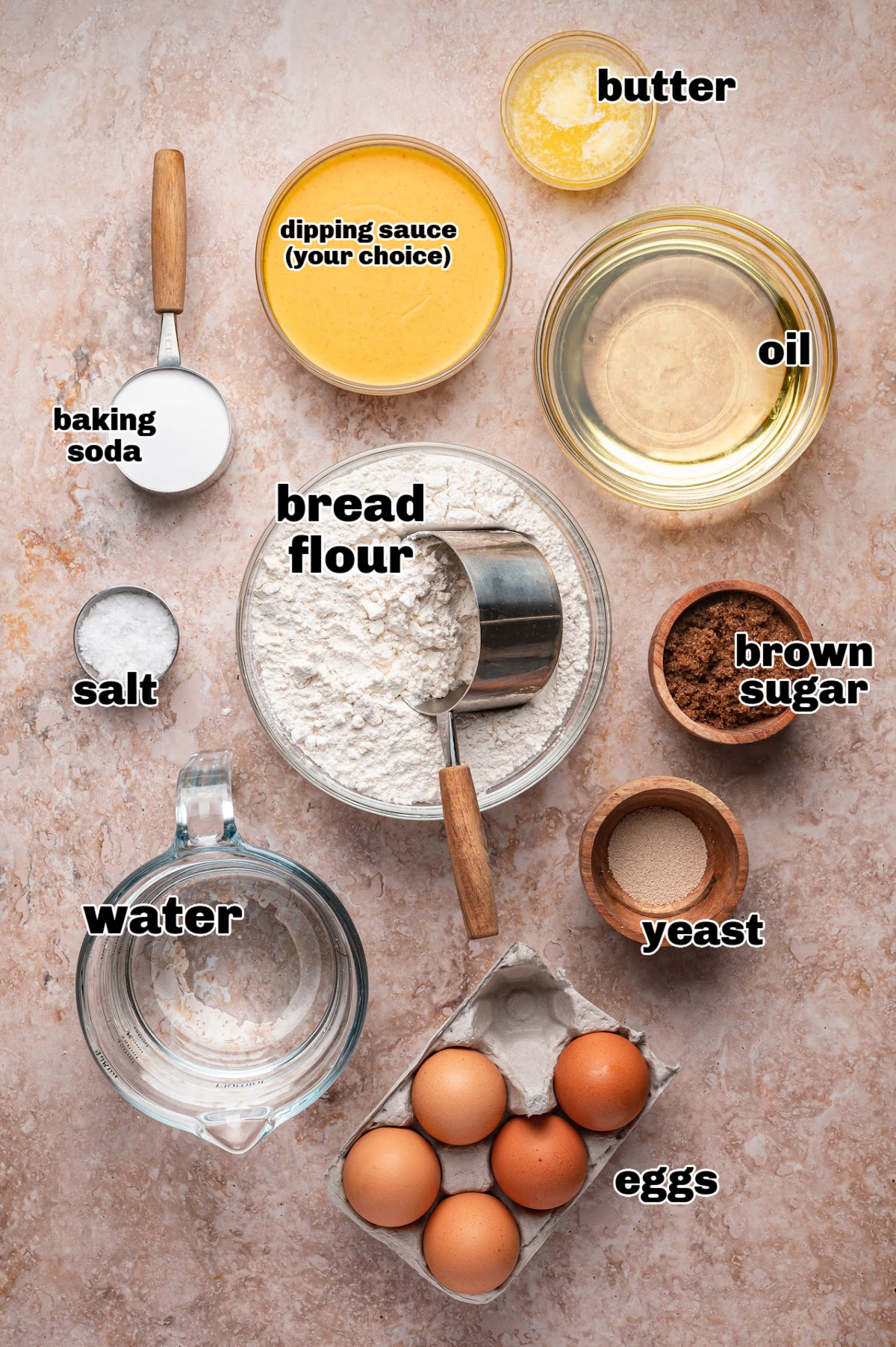 Ingredients needed for soft pretzel bites from scratch ingredients for making homemade pretzel bites including bread flour, yeast, and baking soda