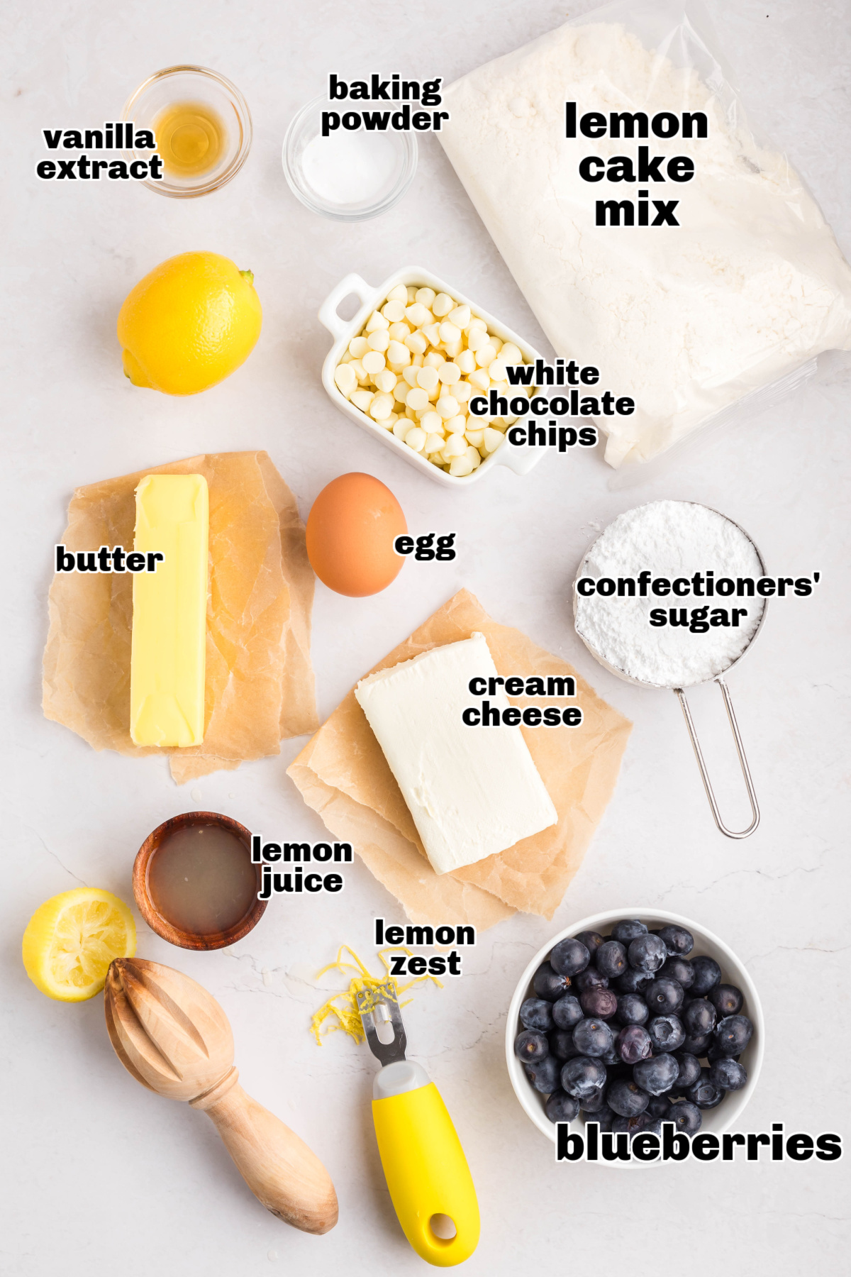 Ingredients for Lemon Blueberry Cake Mix Cookies Labeled ingredients for lemon blueberry cake mix cookies including butter, cake mix, blueberries, and cream cheese
