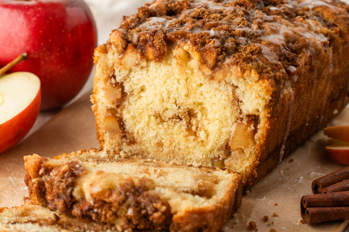 Inside of Amish cinnamon apple bread showing tender crumb and layers of apple filling.