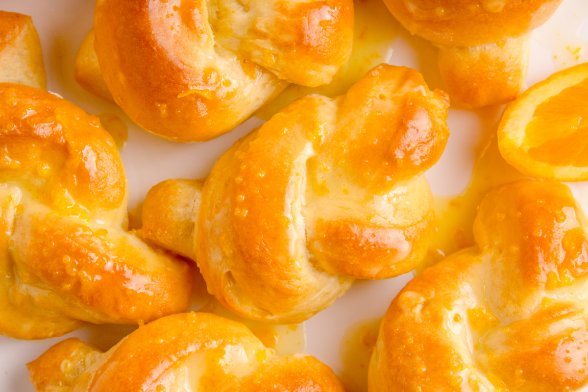 Orange Sweet Rolls with Citrus Glaze Close-up of glazed orange rolls