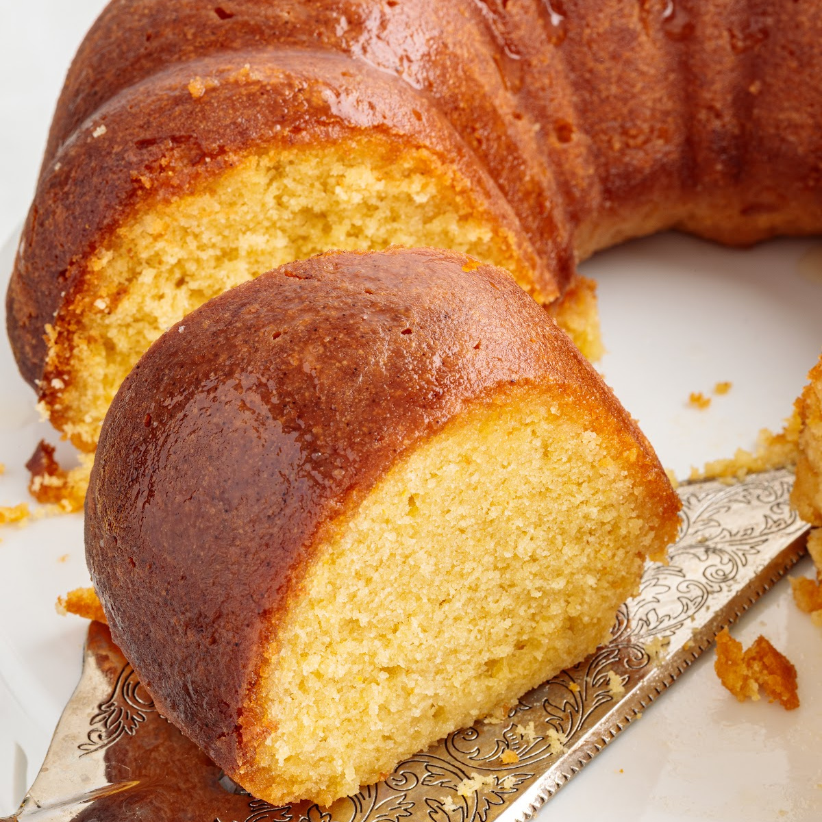 Italian Hangover Cake sliced to show moist citrus almond crumb