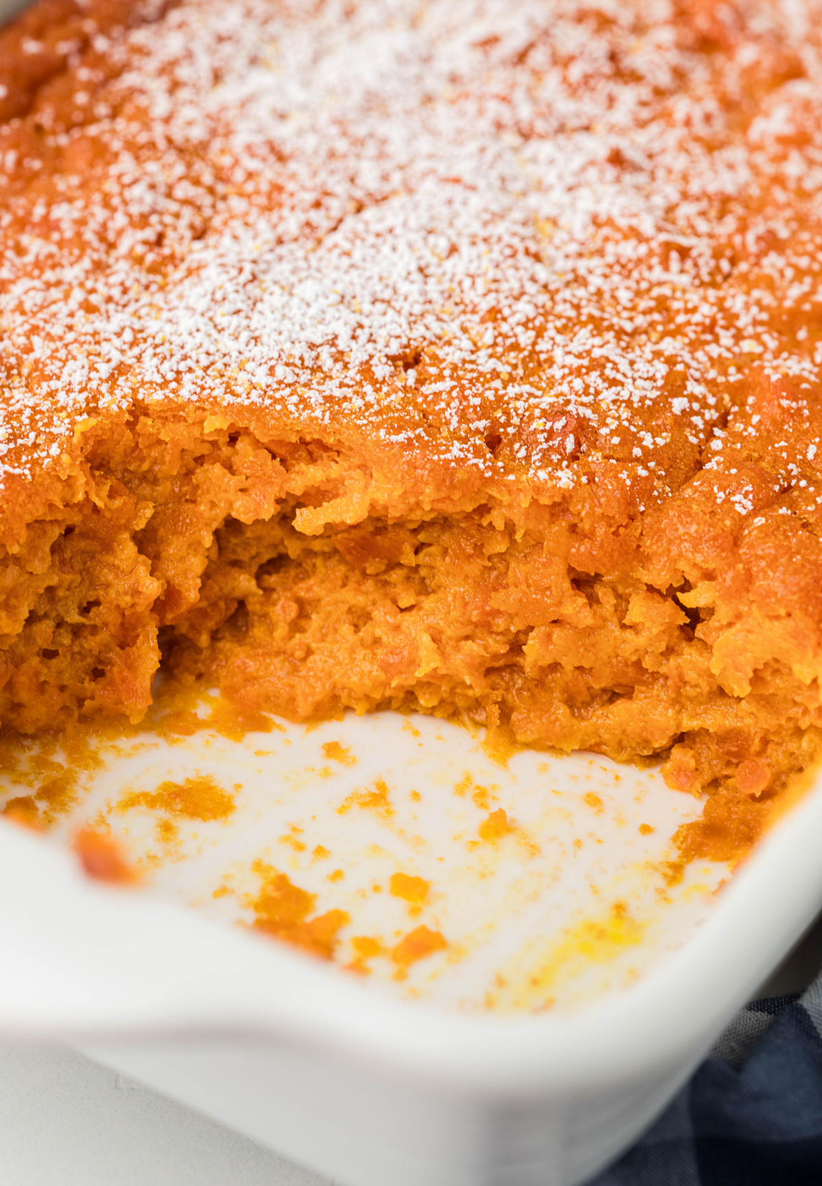 Carrot Souffle texture close-up in 11x7 dish Carrot Souffle showing fluffy interior and lightly browned top in baking dish