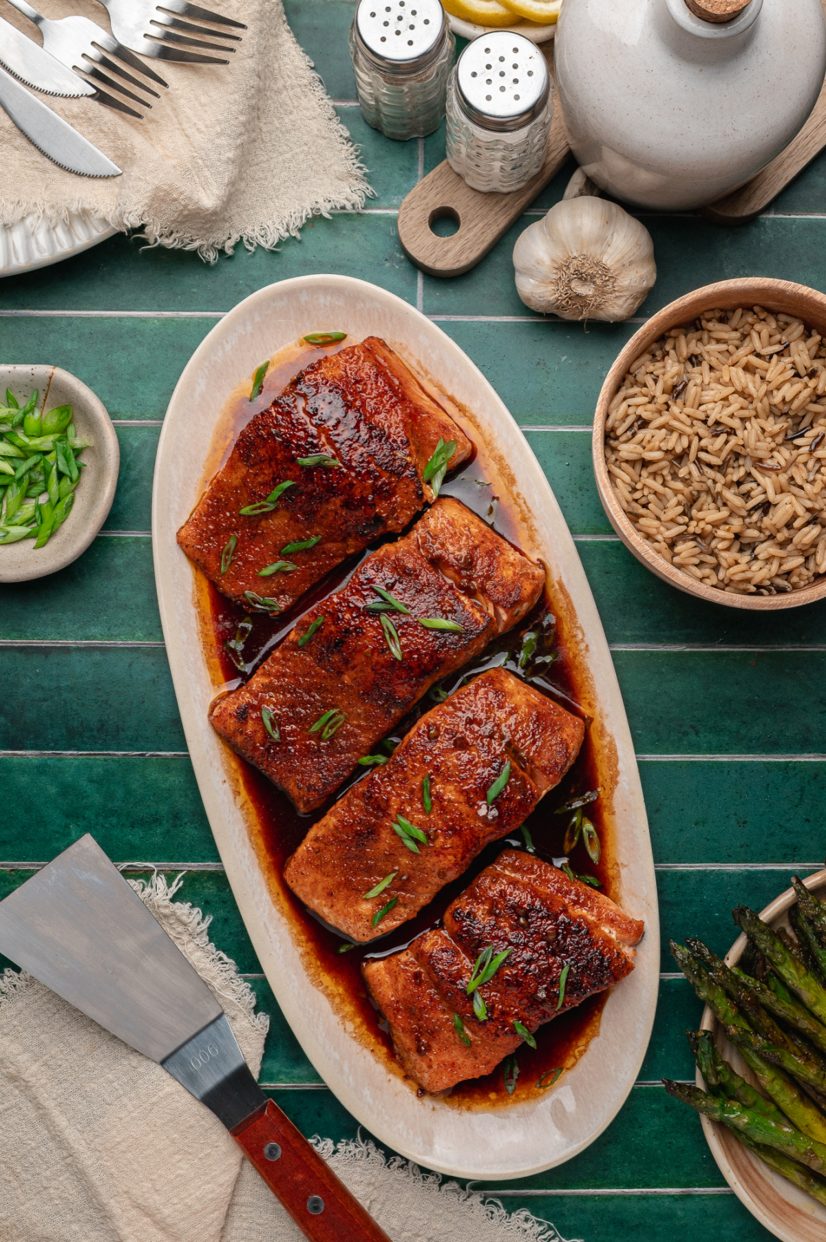 Bourbon Glazed Salmon Platter bourbon glazed salmon on a platter with a rich glossy glaze and green onion garnish