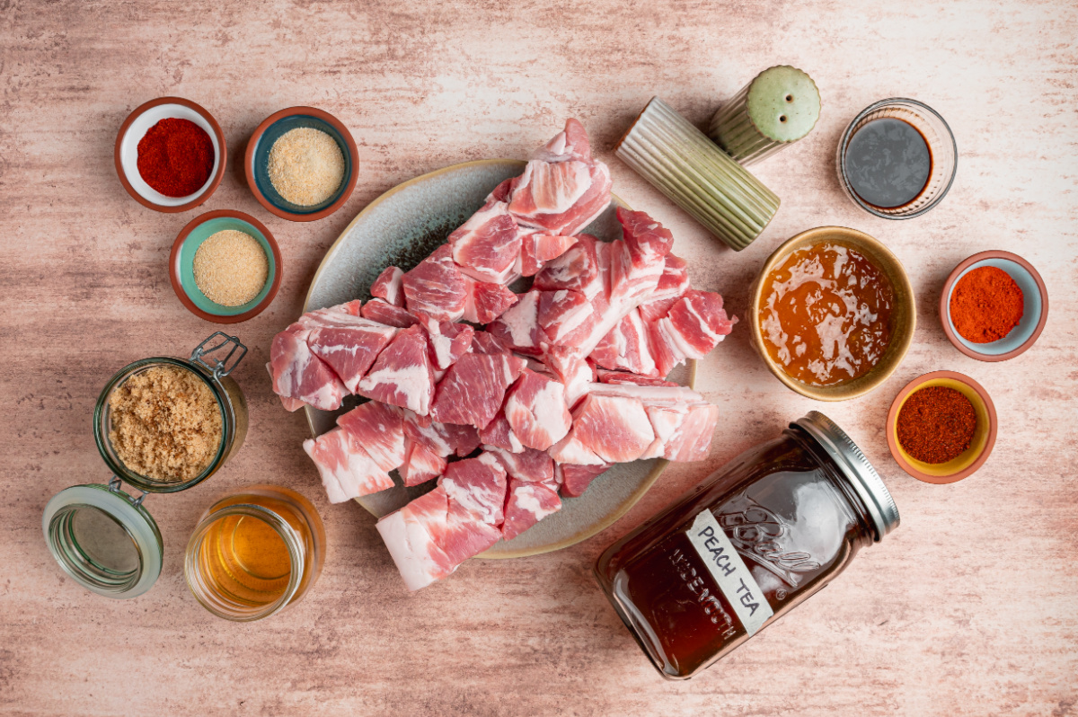 https://noblepig.com/how-to-make-brown-sugar/ Ingredients for Peach Tea Pork Belly Burnt Ends including cubed skinless pork belly, peach tea, peach preserves, barbecue sauce, brown sugar, spices, and seasonings.