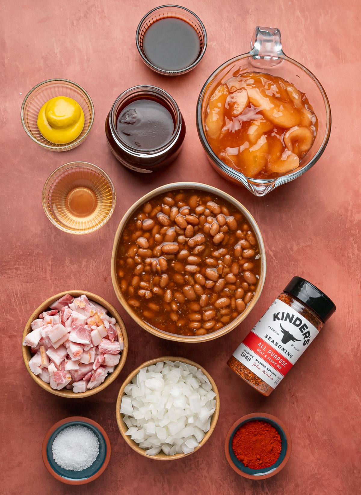 Ingredients for Apple Pie Baked Beans Ingredients for apple pie baked beans including apple pie filling, bacon, baked beans, onion and barbecue sauce