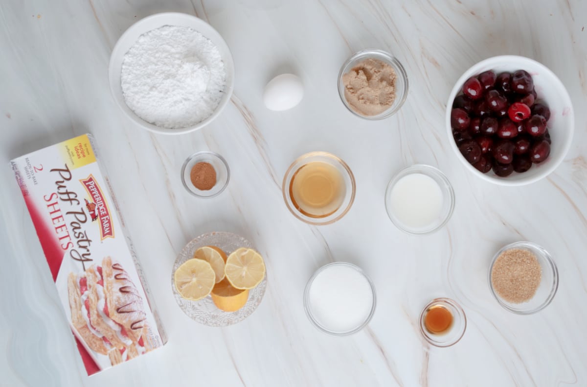 Ingredients for dark cherry puff pastry turnovers with bourbon glaze