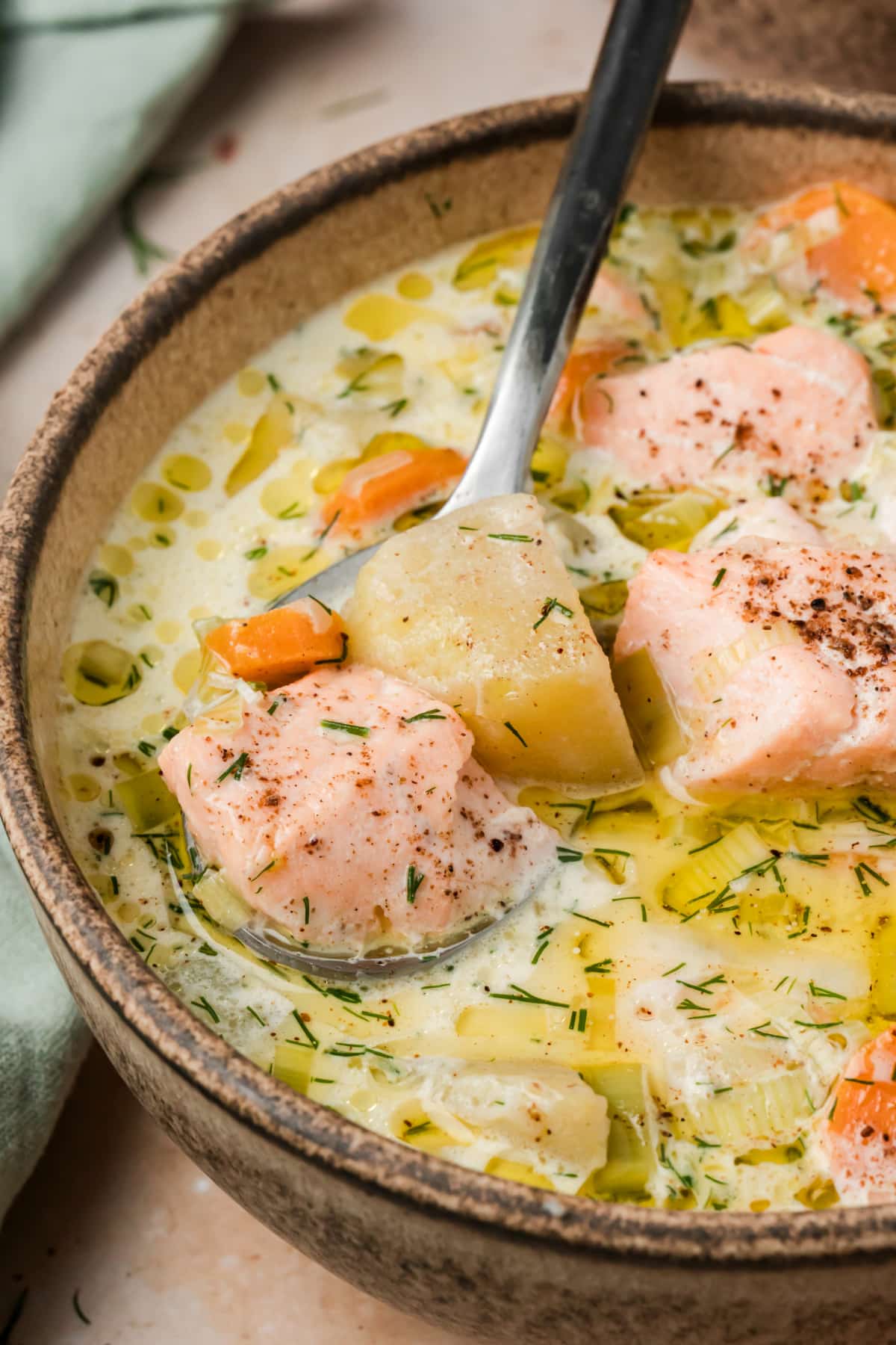 Creamy Finnish salmon soup with tender salmon, potatoes, leeks, carrots and fresh dill. Finnish salmon soup with salmon chunks, Yukon Gold potatoes, carrots, leeks and fresh dill in a creamy broth.